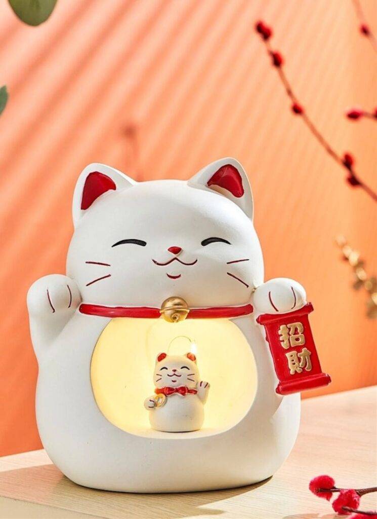 Maneki Neko manifestation symbol How to Use Symbols of Manifestation to Change Your Life