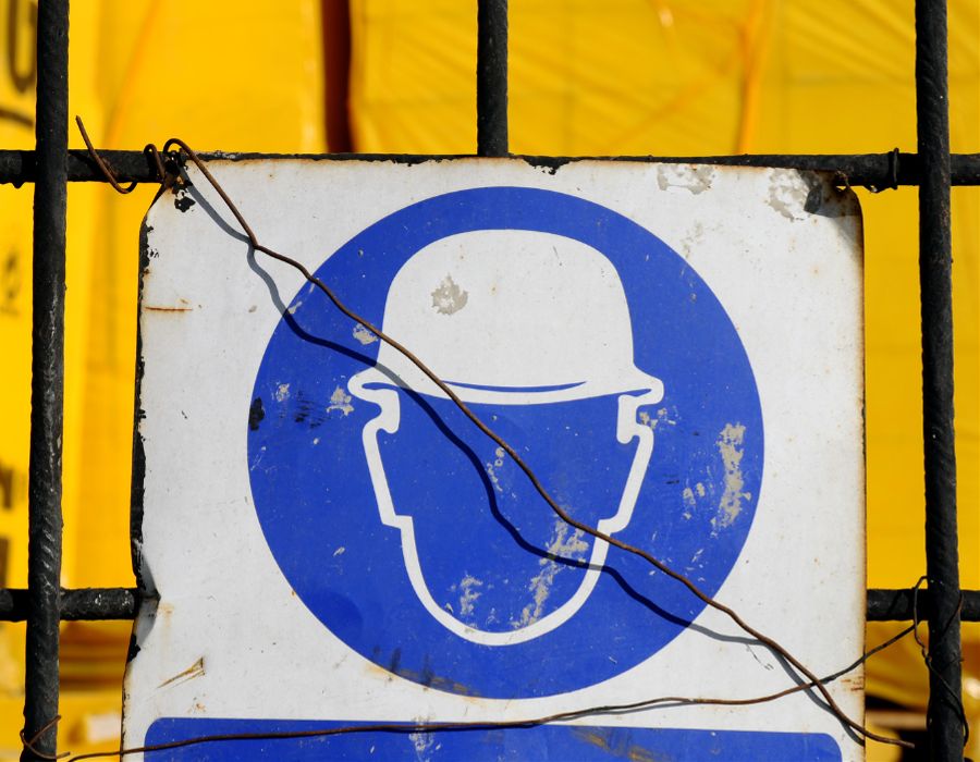 Sign, saying to wear a helmet