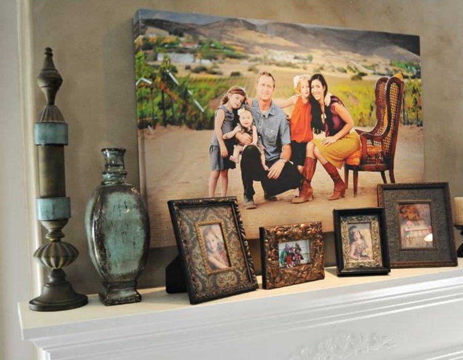 family portraits on mantelpiece