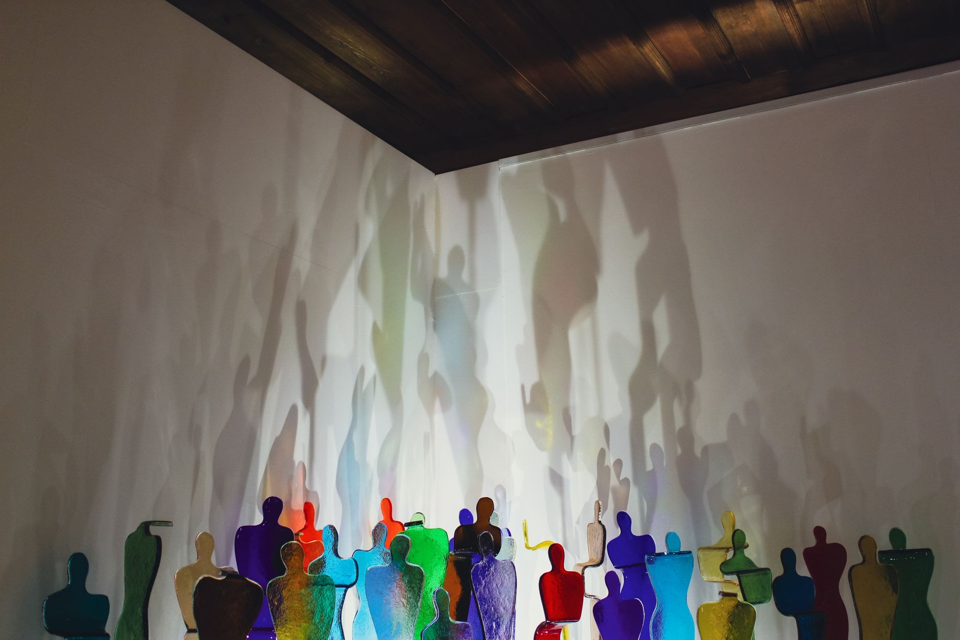 A human silhouette gradually fading or losing color, symbolizing energy depletion.
